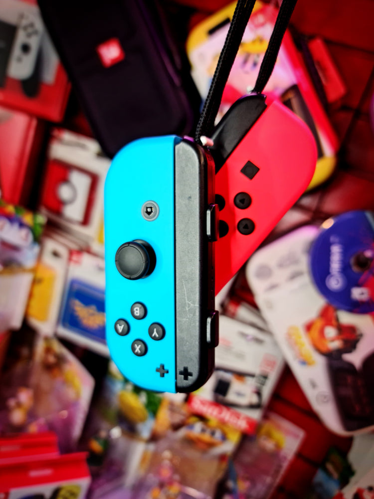 Joycons Nintendo Switch Azul y Rojo Neon